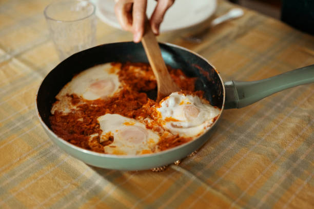 Israeli shakshuka with eggs, tomatoes, and peppers