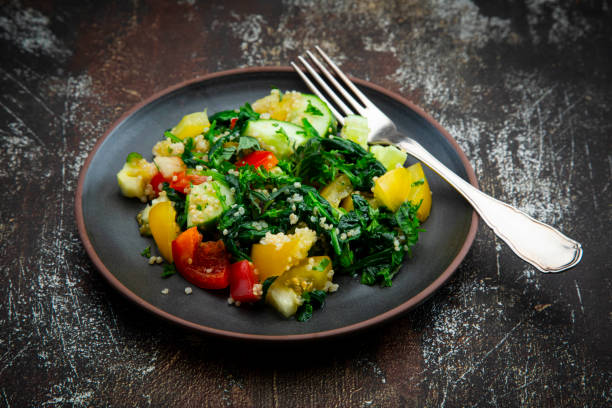 Quinoa bowl with roasted sweet potatoes and kale