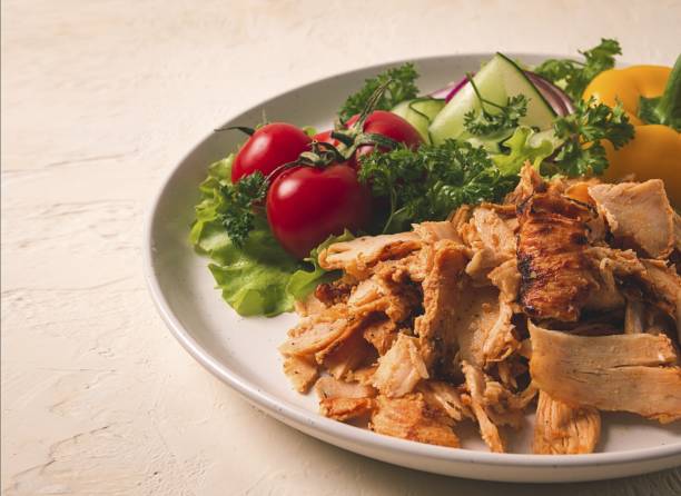 Lebanese shawarma with garlic sauce and pickles